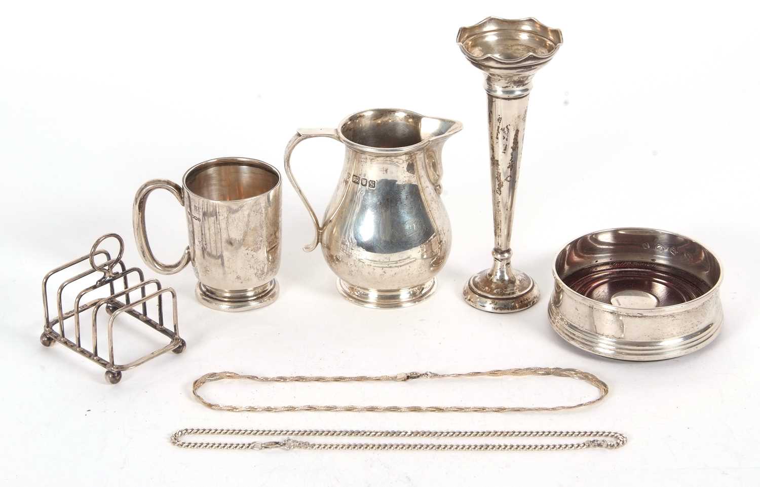 Mixed Lot: An Elizabeth II silver cream sparrow beak jug, London 1961, makers mark for Edward