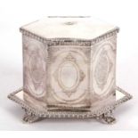 An early 19th Century silver plated biscuit barrel of hexagonal form on integral gadrooned decorated