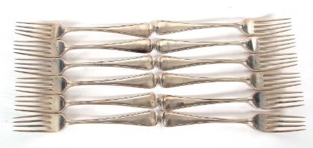 Twelve George III thread pattern double struck thread pattern table forks, 890gms