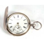 A Dent & Sons of London silver Hunter pocket watch, hallmarked on the inside of the case back, it