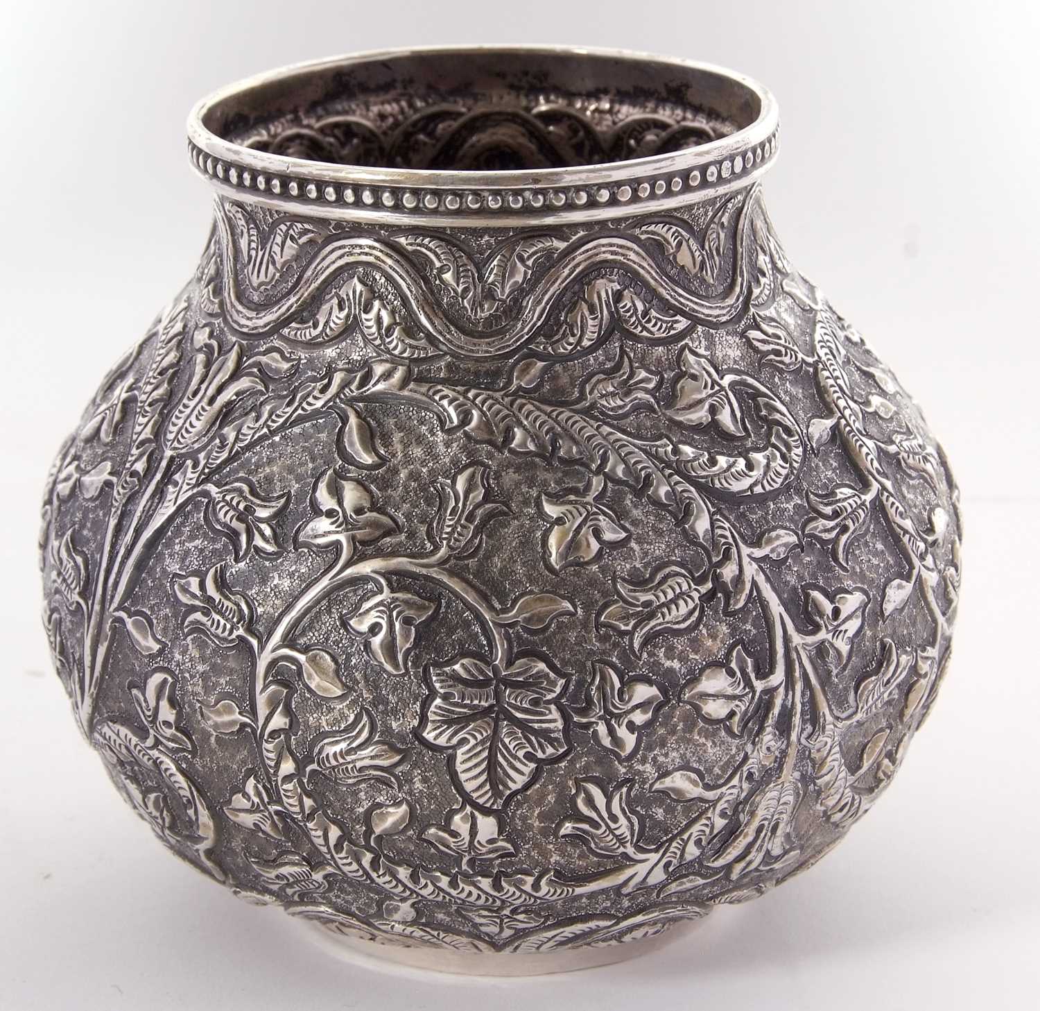 Indian Kutch white metal baluster vase having an all over scrolling foliate patern in repouse and - Image 4 of 8