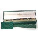 A ladies Gucci 3000L wristwatch, the outer box, box and warranty card are present, it has a quartz