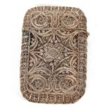An antique Middle Eastern white metal filligree wire cigarette case, circa 1890 having a sprung