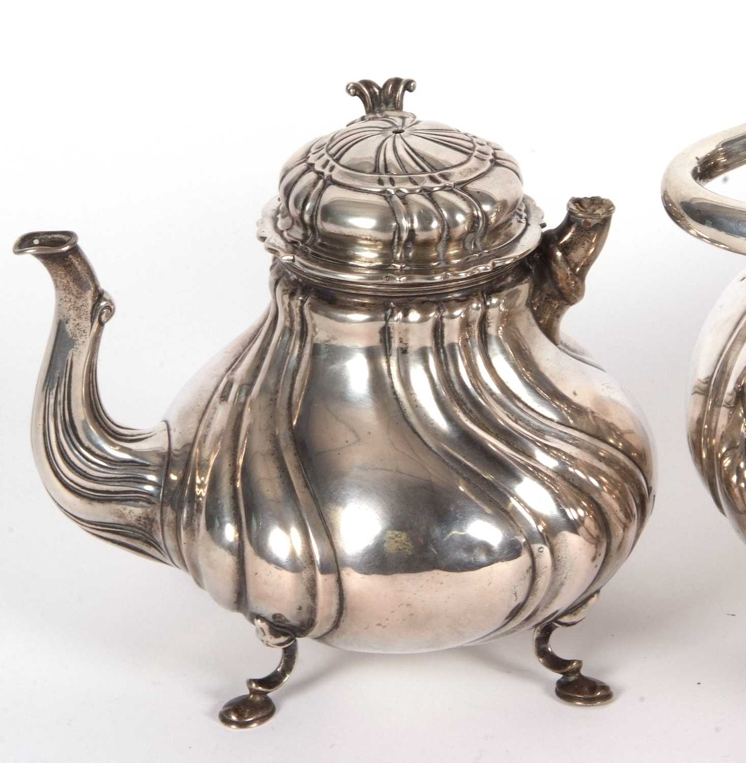 A 19th Century German white metal tea set comprising a large coffee pot, teapot, hot water kettle, - Image 3 of 9