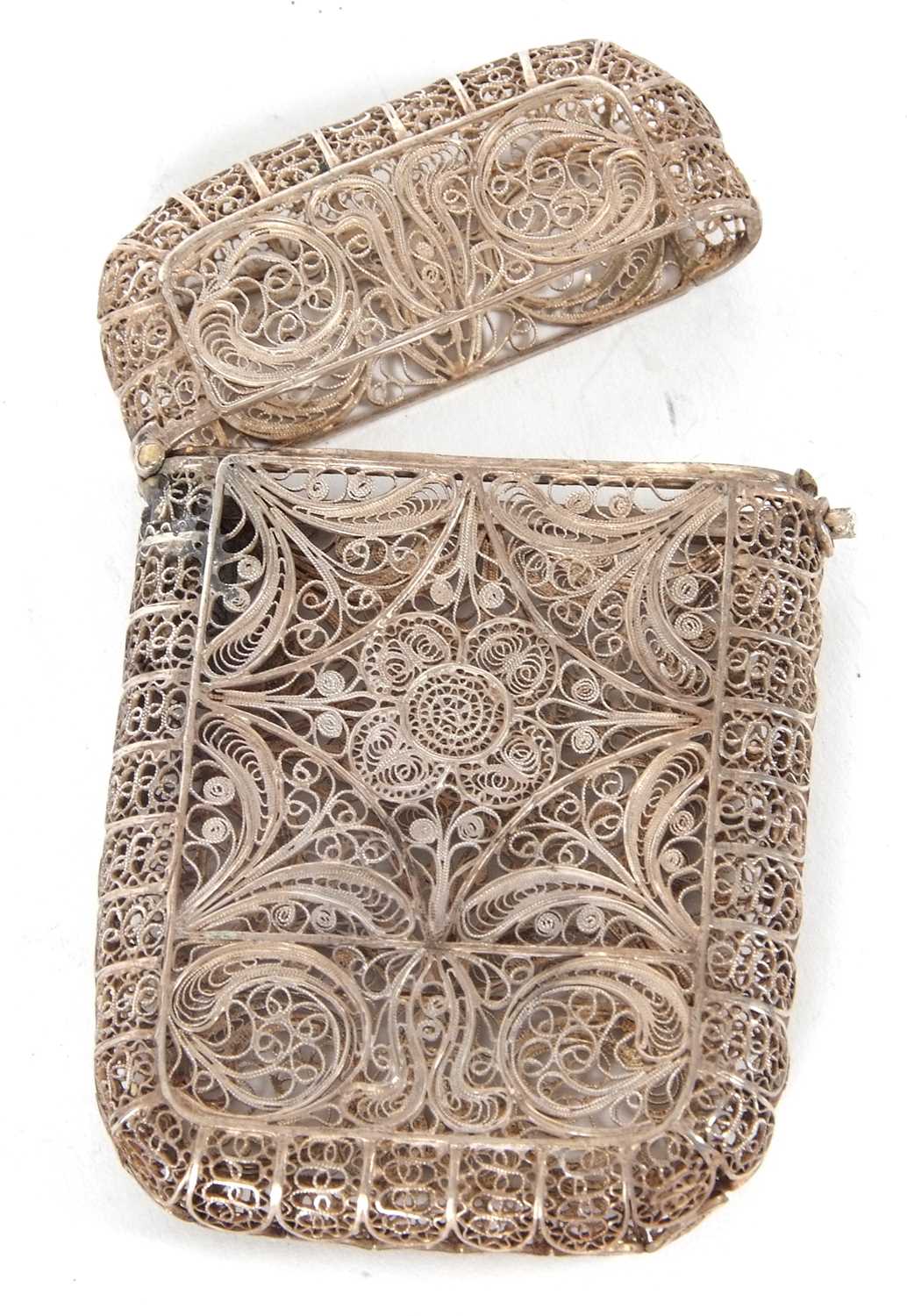 An antique Middle Eastern white metal filligree wire cigarette case, circa 1890 having a sprung - Image 2 of 2