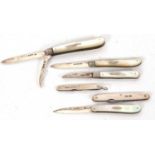 Group of four silver bladed and mother of pearl handled folding fruit knives together with two