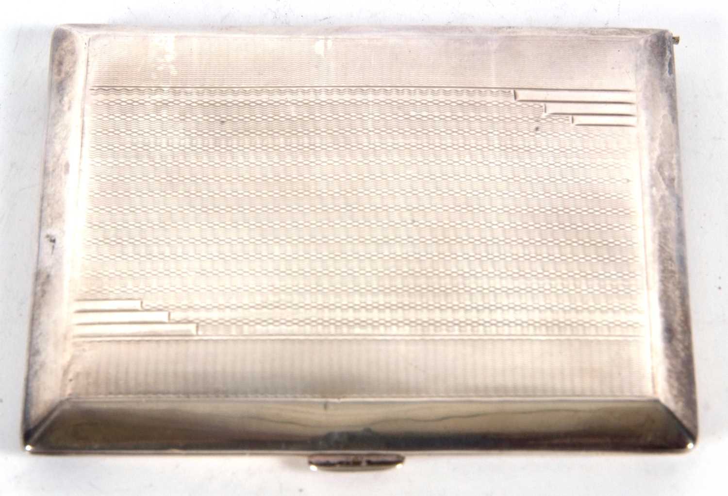 An Art Deco silver cigarette case of rectangular form, engine turned decoration, front and back - Image 2 of 5