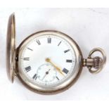 A silver Hunter pocket watch, hallmarked inside the case back along with 2oz, it has a Buren stamped