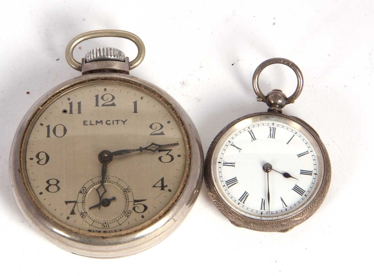 Two pocket watches, one ladies white metal stamped 0.935 the other a metal Elm City with a train