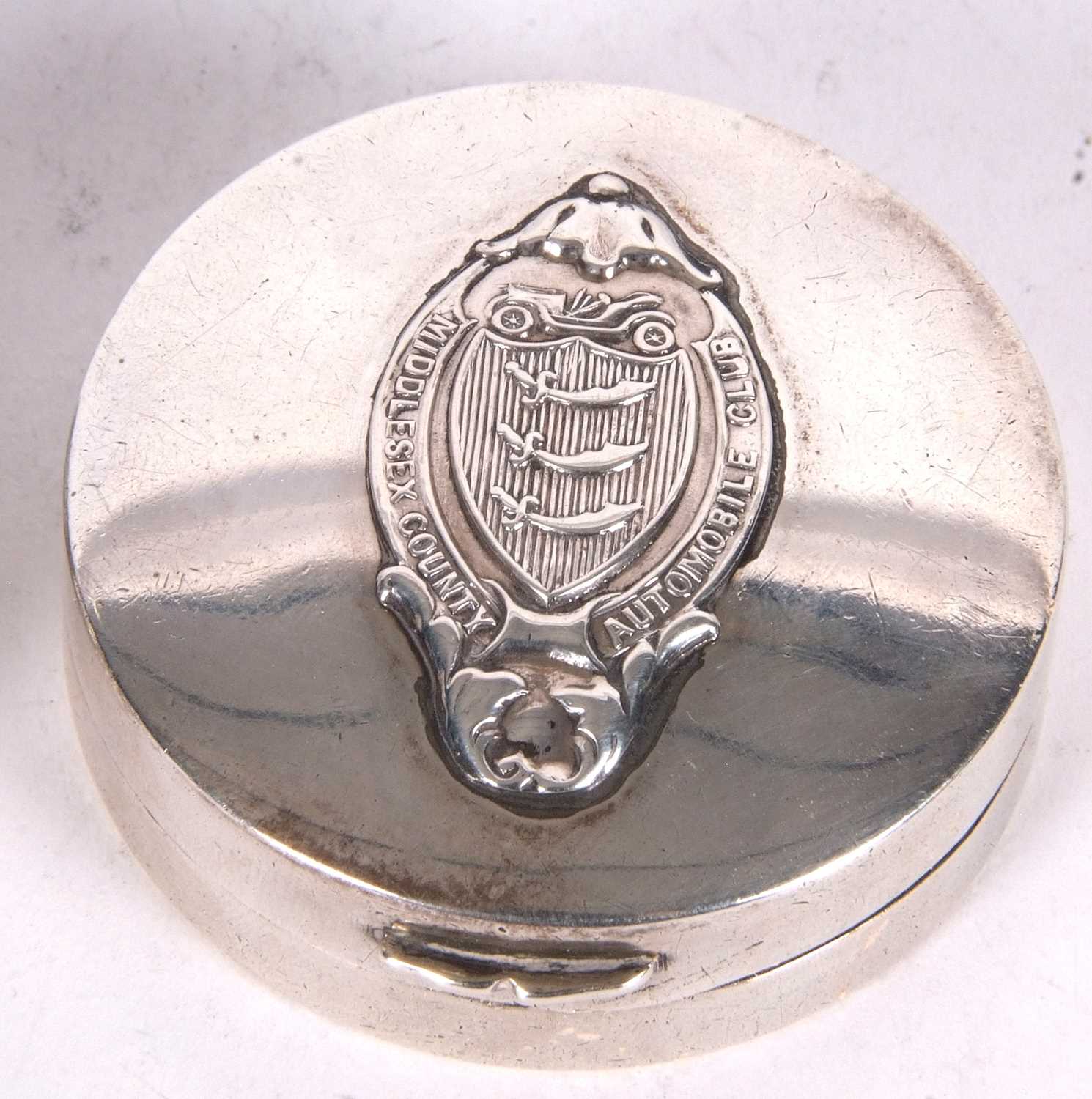 Motoring Interest - An Art Deco ladies silver compact of plain circular form, the hinged lid applied - Image 4 of 7