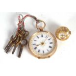 A yellow metal pocket watch with chain fob watch, the pocket watch is stamped on the inside of the