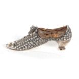 A Victorian silver pin cushion in the form of a shoe, hallmarked Birmingham 1895, makers mark for