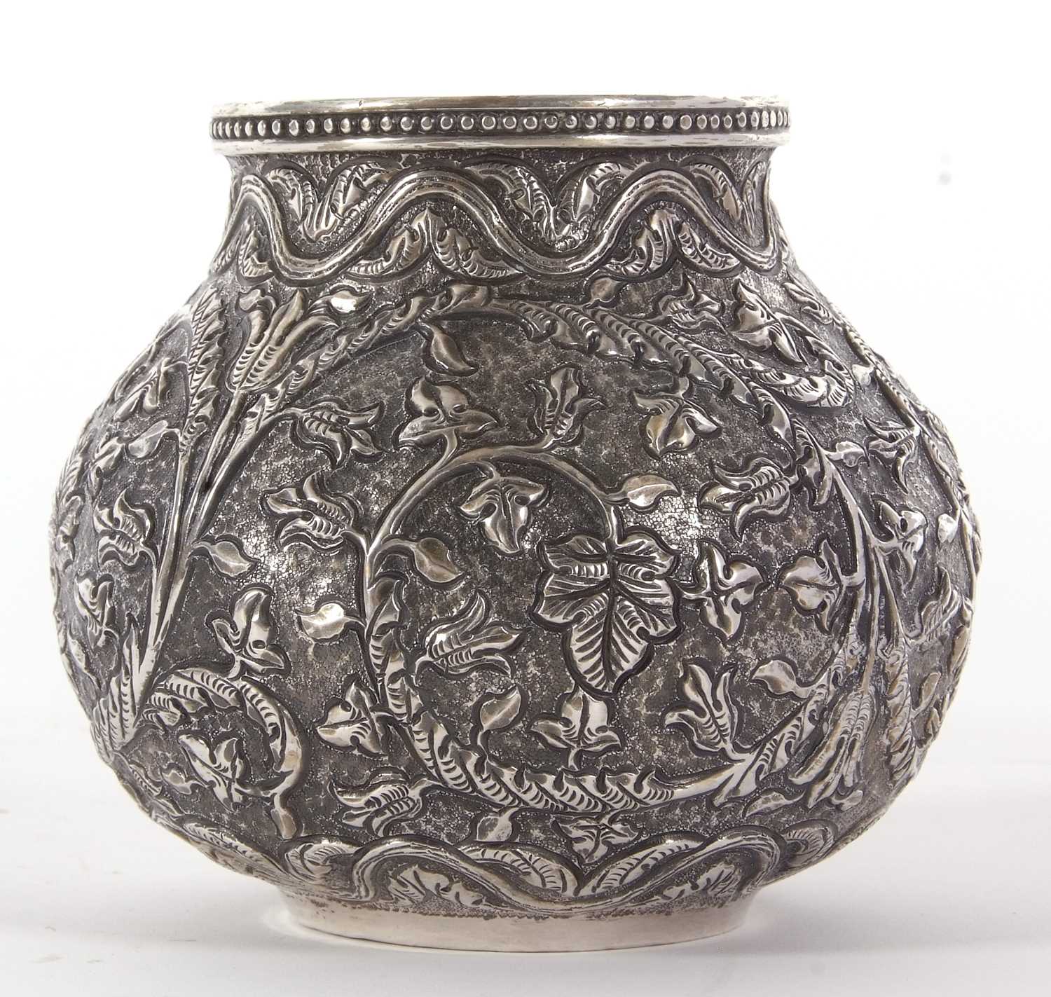 Indian Kutch white metal baluster vase having an all over scrolling foliate patern in repouse and - Image 2 of 8