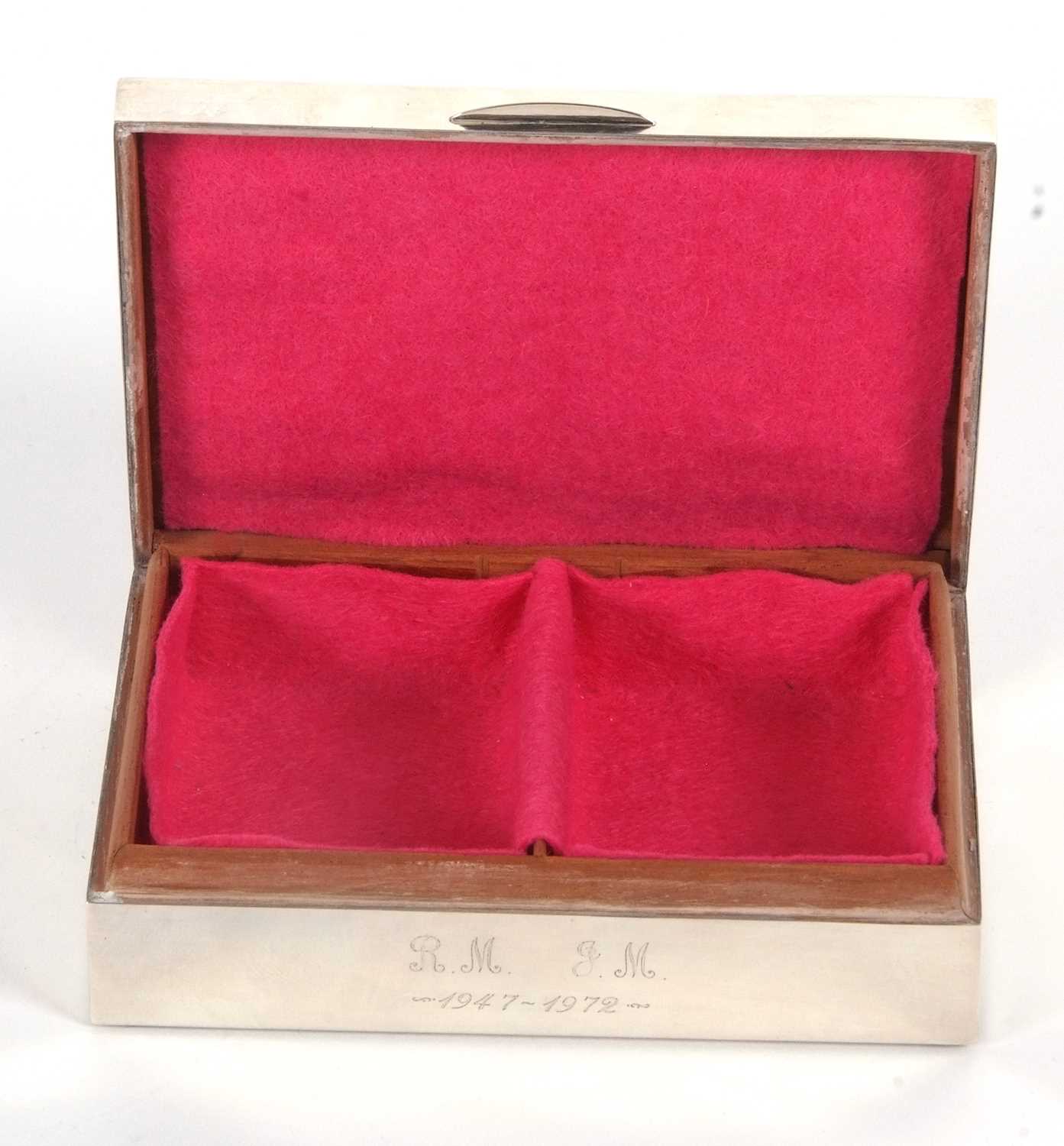 An Elizabeth II silver cigarette box of rectangular form, having an engine turned decorated lid with - Image 3 of 3