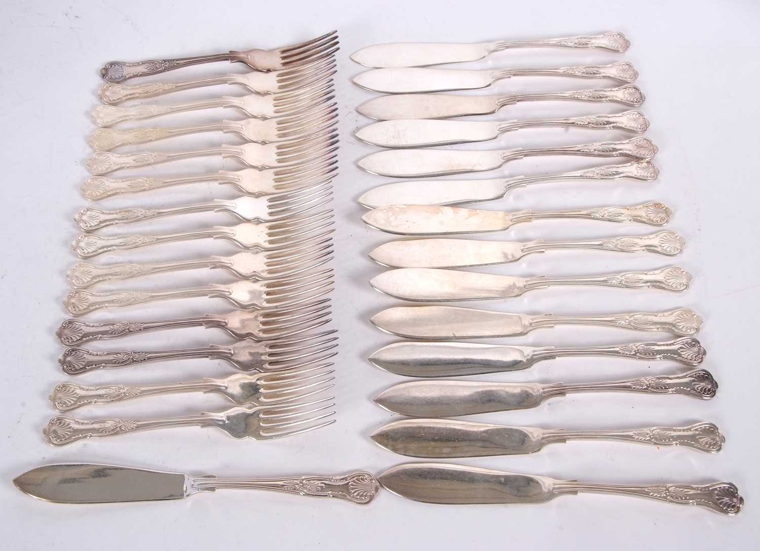 A group of silver plated Kings pattern fish servers to include fifteen knives and fourteen forks