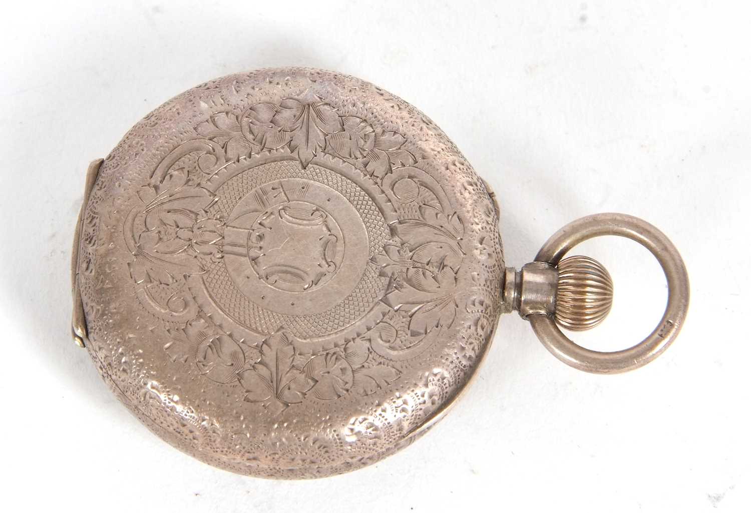 A white metal pocket watch, the pocket watch case back is stamped 925, it has a crown wound movement - Image 2 of 2