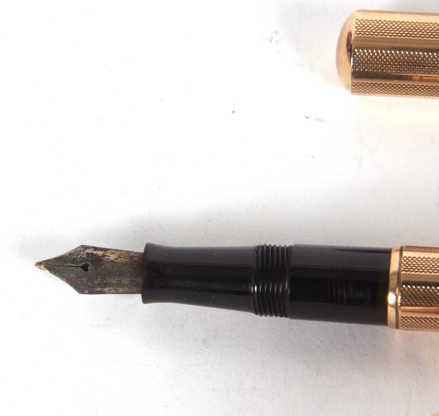 A Watermans Ideal 9ct gold cased fountain pen, engine turned decorated barrel and screw off cap, - Image 7 of 7