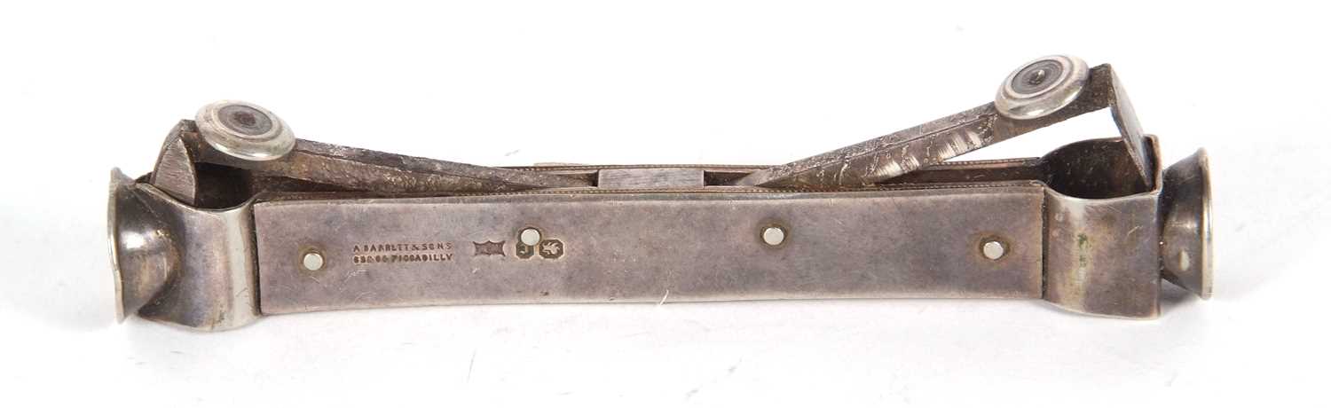 A late Victorian silver cased double ended cigar cutter with steel arms and blades, hallmarked for - Image 2 of 2