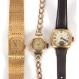 A mixed lot of ladies wristwatches to include a 9ct gold Tissot, a metal Tissot and a Rotary with