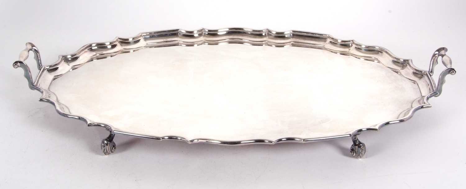 An early 20th Century large twin handled oval shaped tray with pie crust border and plain ground, - Image 2 of 2