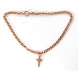 A 9ct gold watch chain with cross pendant, hallmarked on every link, g/w approx 31gms, approx length