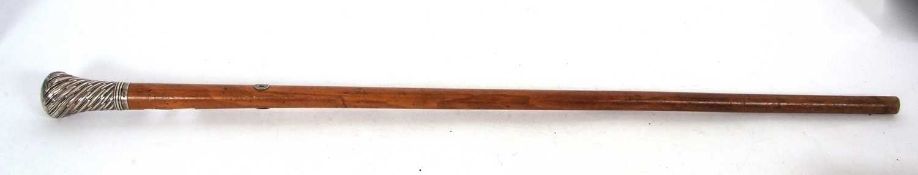 A Victorian silver embossed topped walking stick, hallmarked for London 1891, makers mark for Thomas