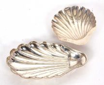 A Victorian silver shell dish in elongated form supported on two front feet formed as winkle shells,