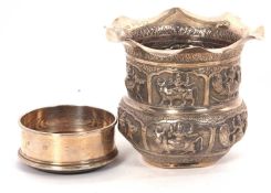 Mixed Lot: A 19th Century white metal Burmese repousee decorated small jardiniere depicting