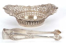Mixed Lot: An oval pierced bonbon dish marked 800, 14cm long, together with a large pair of