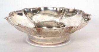 A George V silver dish of plain flower petal form, hallmarked for Sheffield 1918, makers mark Cooper