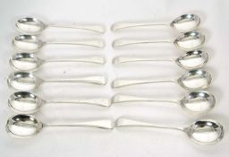 Twelve Elizabeth II silver soup spoons, Old English pattern, Sheffield 1975, makers mark for the