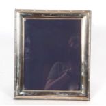 A Carrs of Sheffield large photograph frame, plain polish with reeded and cross edge, easel backed