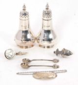 Mixed Lot: A pair of small Victorian silver peppers, Sheffield 1898, a hallmarked silver spirit