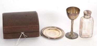 Victorian travelling communion set comprising chalice, paten, hallmarked for 1861, a wine bottle