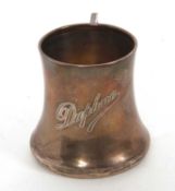 George V silver christening mug of plain form with angular scroll handle with waisted body, engraved
