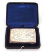 A cased Edwardian silver aide memoire, elaborately chased and engraved with baskets of flowers,
