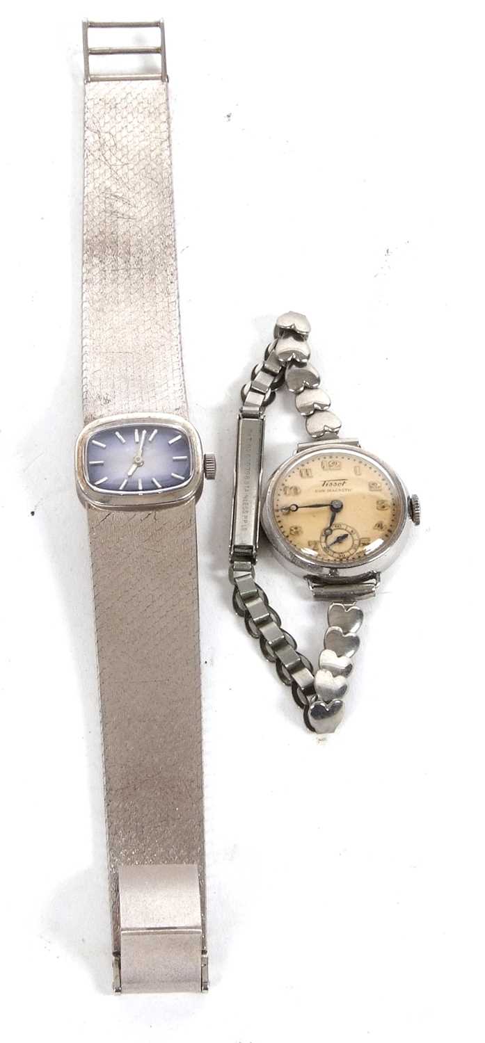 Two lady's wristwatches, one vintage white metal Rotary and one Tissot stainless steel ladies watch,