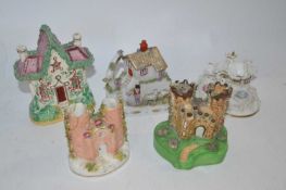 Small group of mainly Staffordshire cottages, pastille burners, mid to late 19th Century