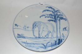 A Isis Ceramics large plate from the Exotic Animals collection, decorated in Delft style with an