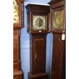 A Georgian oak cased long cased clock with square brass dial with figural spandrels, the face signed