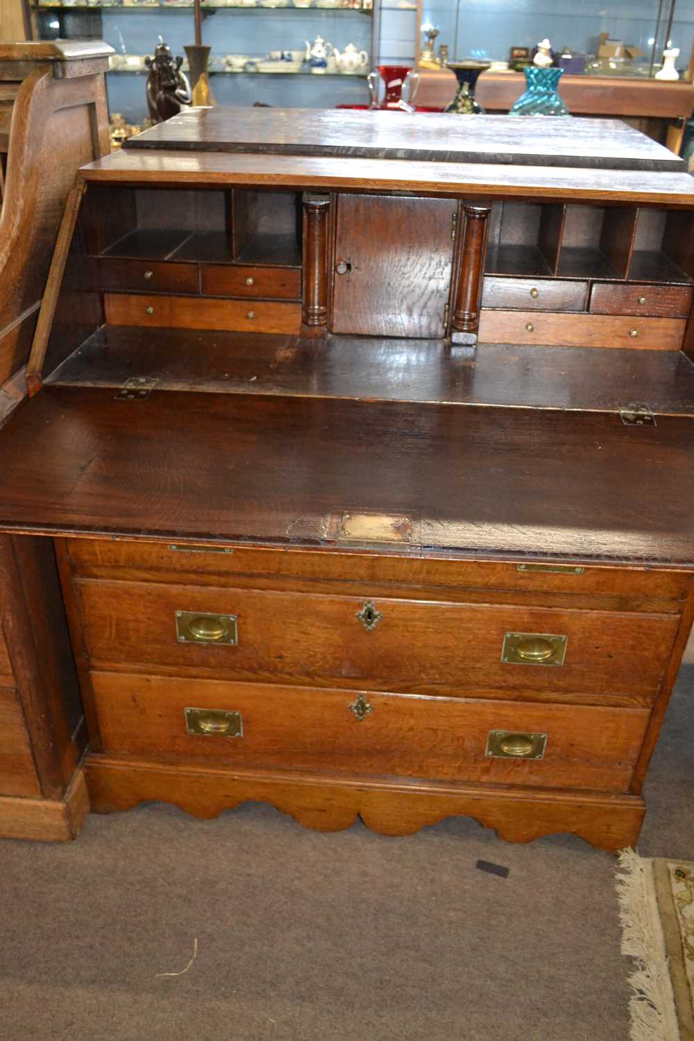 George III oak bureau of typical form with full front opening to an interior with pigeon holes and - Image 2 of 2