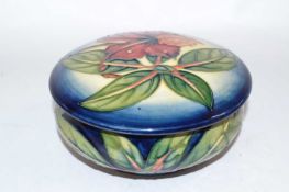 A Moorcroft box and cover in the Simeon design, 13cm diameter Goood condition no damage/repairs