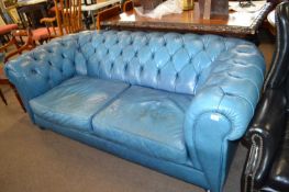 A Tetrad pale blue leather buttoned Chesterfield type sofa, 200cm wide