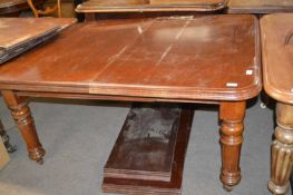 Victorian mahogany extending dining table on turned legs together with three further extension