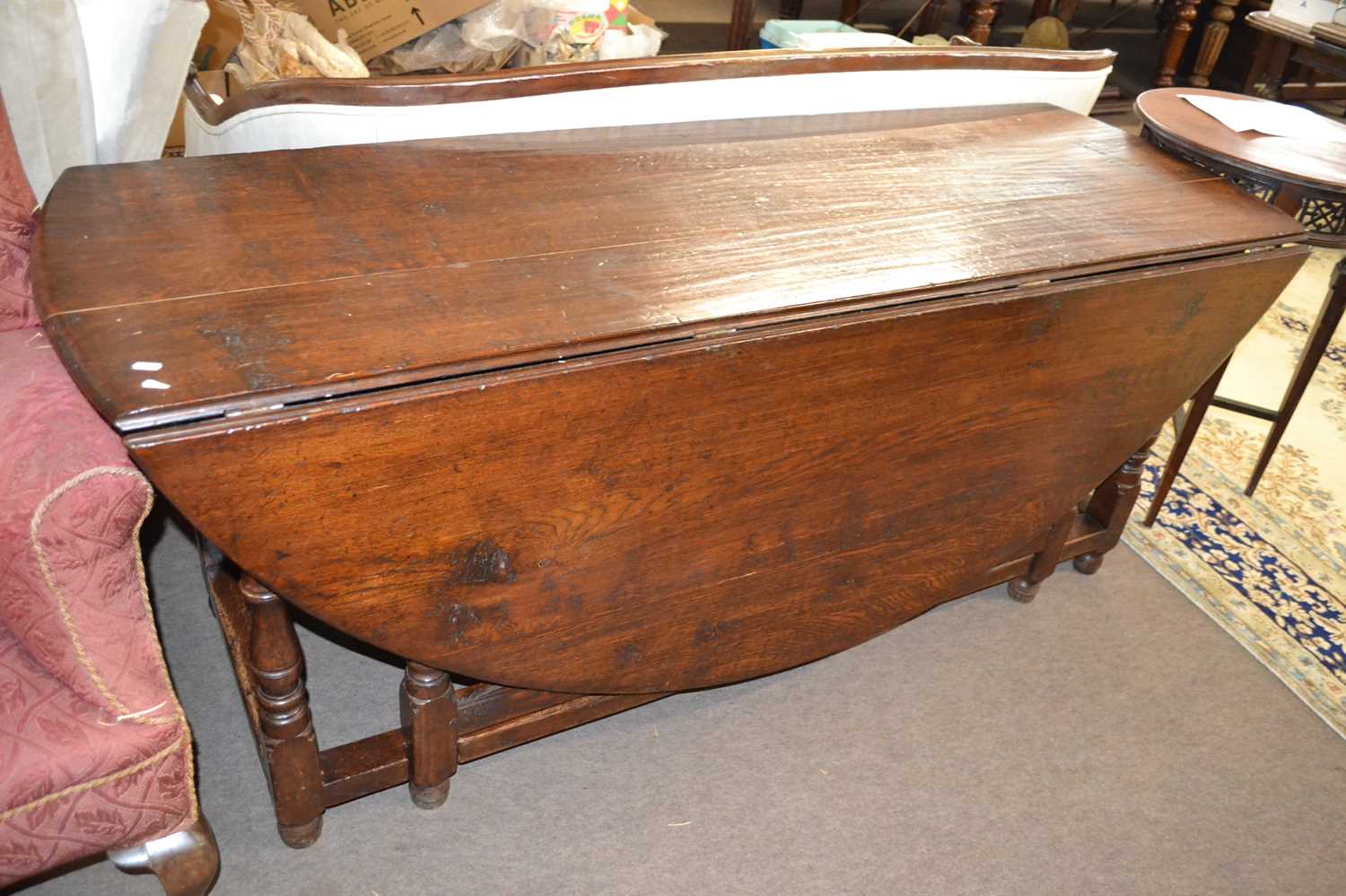 Large oak drop leaf dining or wake table in the 18th Century style with turned gate legs, probably