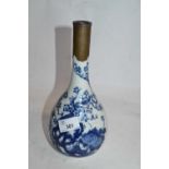 A Chinese porcelain vase, baluster body with blue and white decoration and metal repair to rim