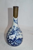 A Chinese porcelain vase, baluster body with blue and white decoration and metal repair to rim