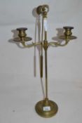 Brass candelabra with snuffer, 54cm high