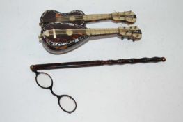 Small tortoiseshell model of a guitar and one other together with tortoiseshell spectacles