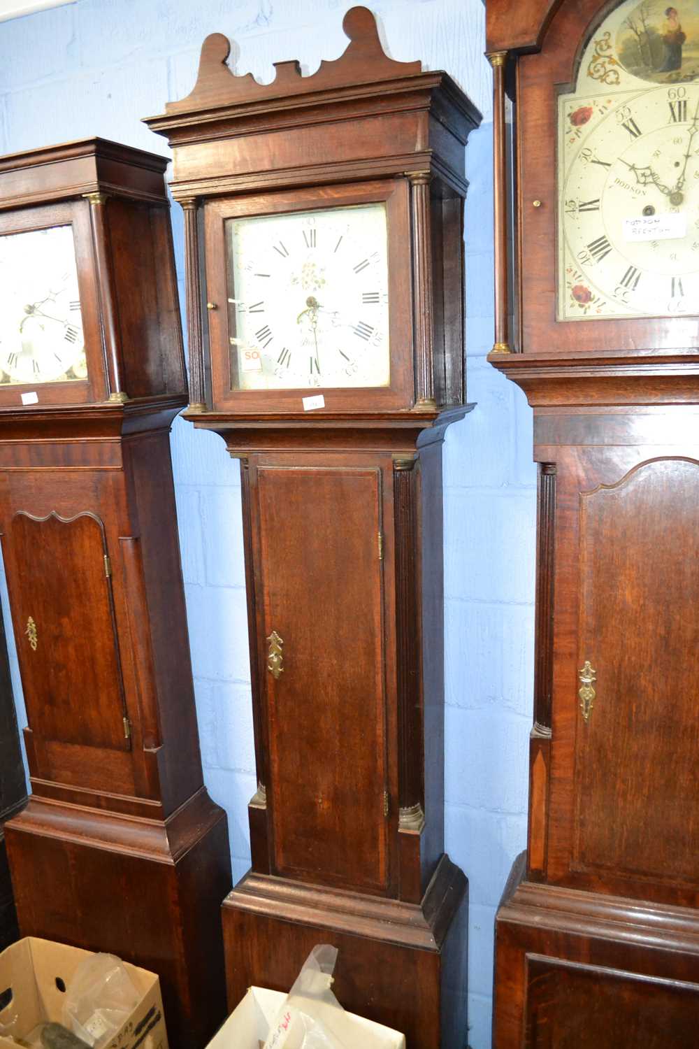 C.Stokes, Bewdley (Worcestershire), a Georgian oak and mahogany cross banded long case clock set